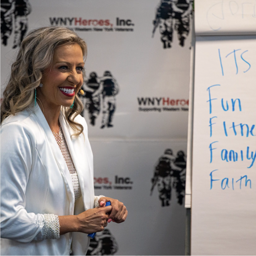 Krystalore Crews speaking to a group at WNY Heroes event
